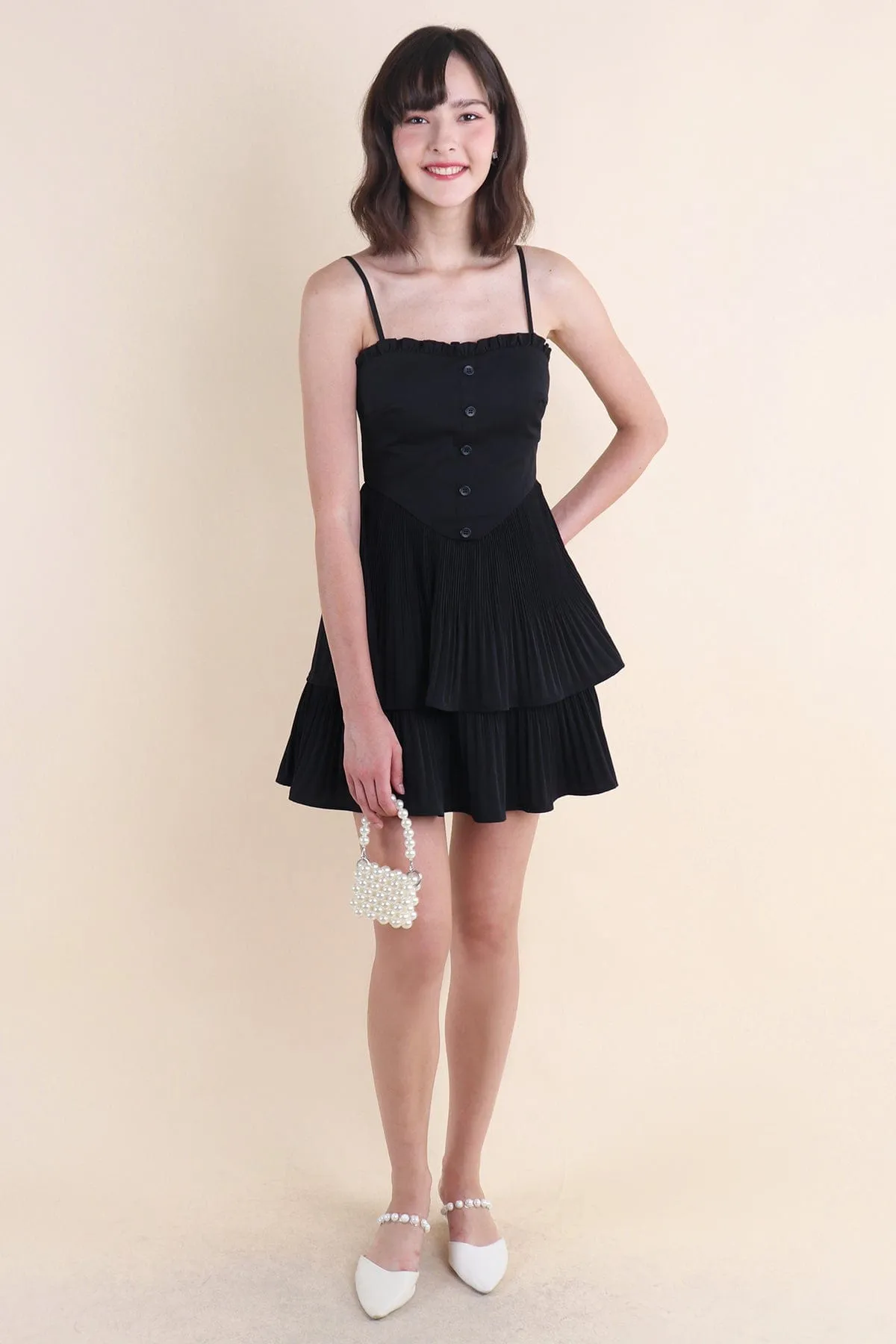 BEVELYN PLEATED MINI DRESS IN BLACK