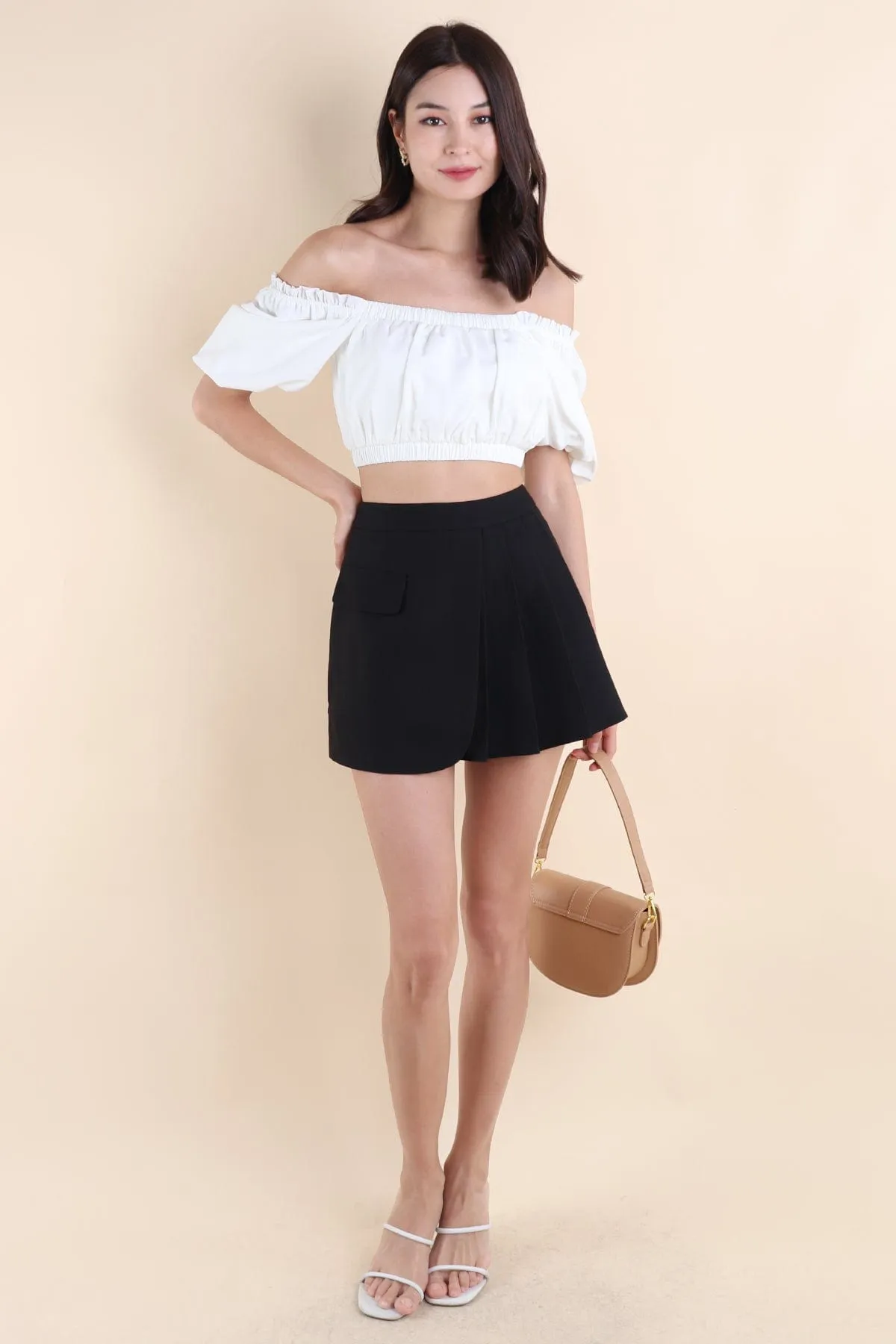 KERRI PLEATED SKIRT IN BLACK